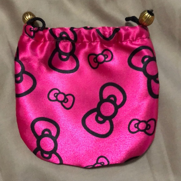 Hello Kitty Handbags - 3 for $10 Pink and black Hello Kitty Pouch